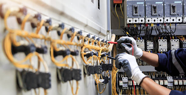 Professional Electrician technician working in Hamilton Square, NJ
